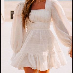 Gorgeous short white dress by Aje, perfect for bridal events
